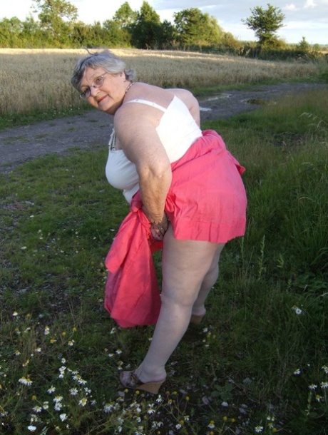 Obese Oma Grandma Libby Exposes Her Huge Ass While In A Field By A