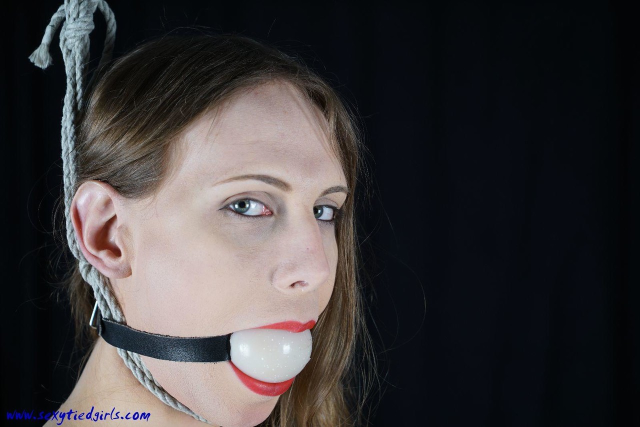 White girl sports a ball gag a noose before being blindfolded in bondage -  NakedPics