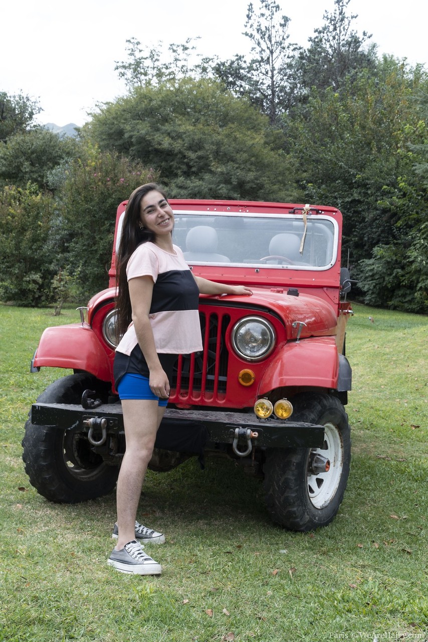 First timer Paris gets naked before spreading her bush on top of a Jeep -  NakedPics