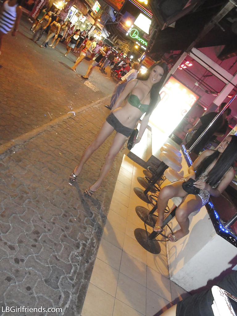 Sexy Thai shemale Army shows off her big tranny tits on public street -  NakedPics