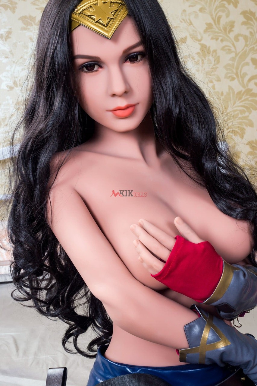 Gorgeous wonder woman sex doll shows her big tits in her battle outfit -  NakedPics