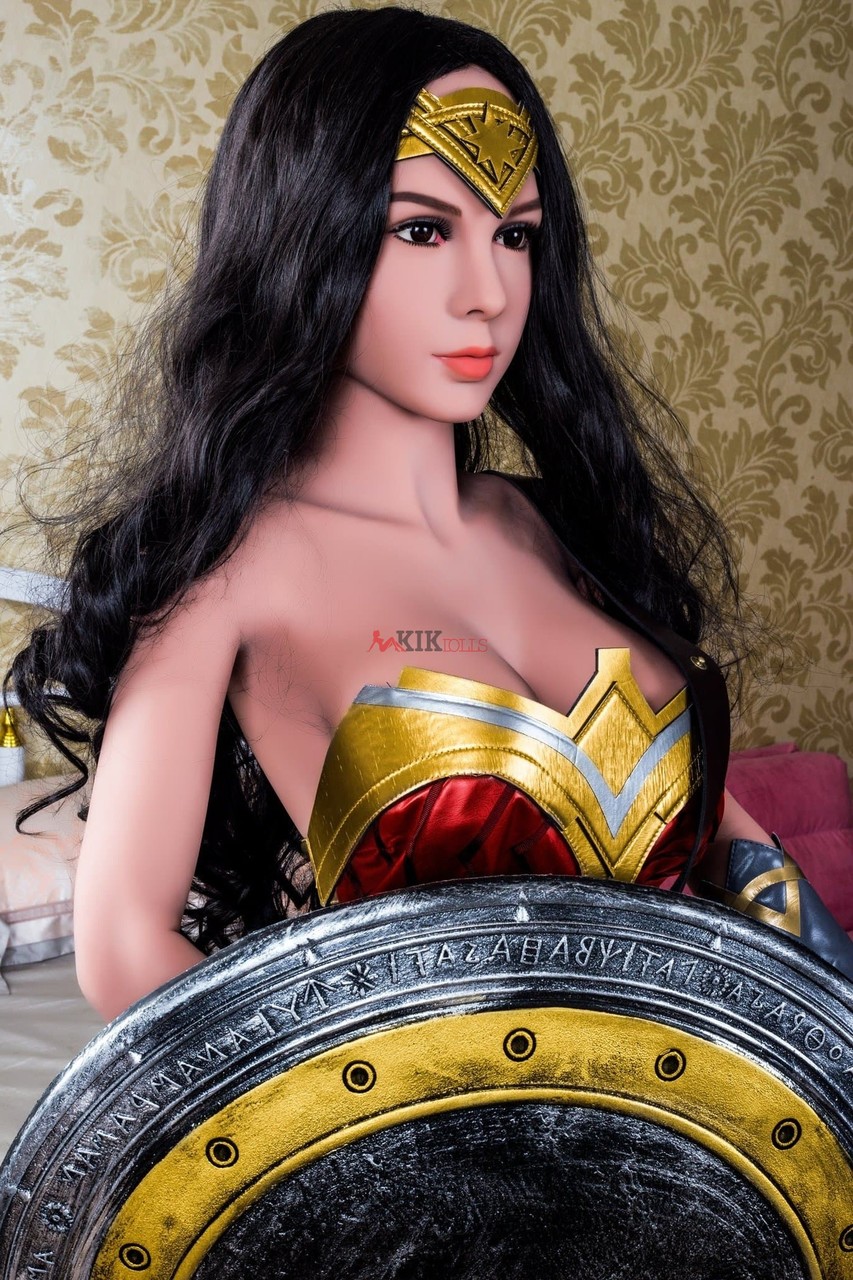 Gorgeous wonder woman sex doll shows her big tits in her battle outfit -  NakedPics