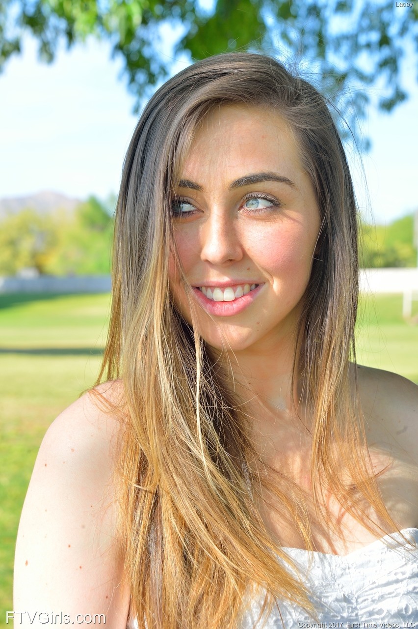 Sweet teen with lusty eyes Lacey flashes her cunt while posing in the park  - NakedPics