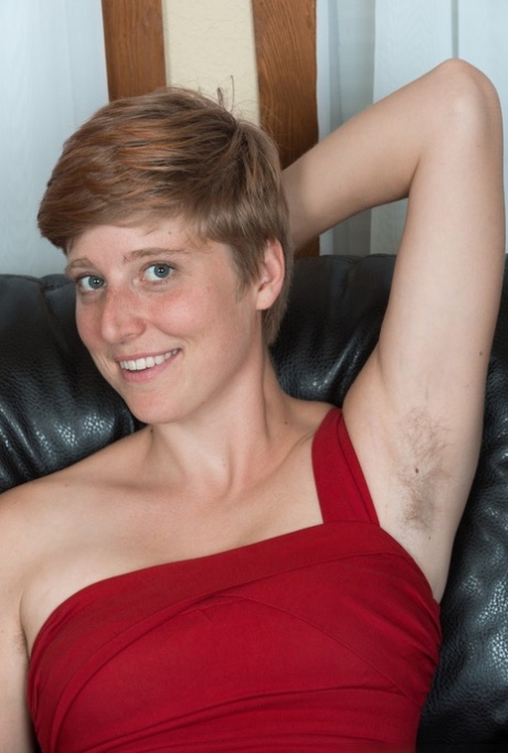 Short haired amateur Aurora Odaire proudly shows her unshaven pits and pussy