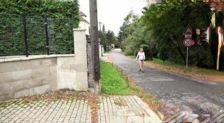 Hidden voyeur catches a girls taking a piss behind a cinder block wall