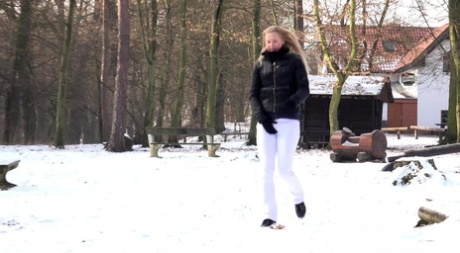 Solo girl Violette squats on a bench for a piss in the dead of winter