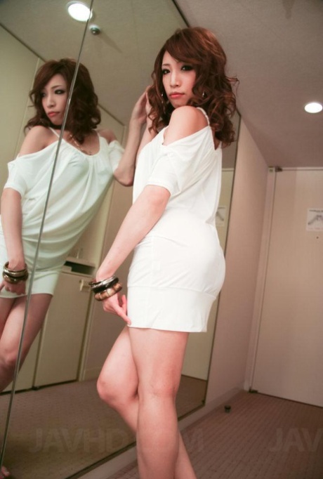 Hot Japanese girl Aya Sakuraba models in front of a mirror before giving head