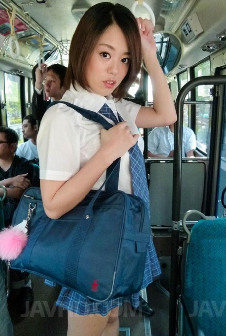 Japanese coed Yuna Satsuki is groped before sucking cock on a public bus