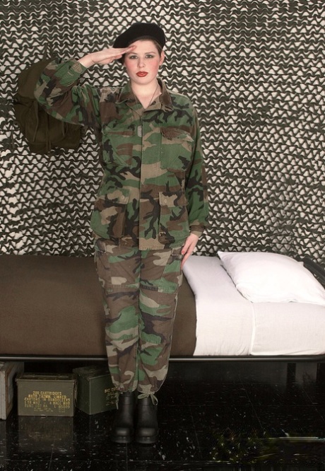 Chesty Desirae peels off her military uniform to fondle massive saggy juggs