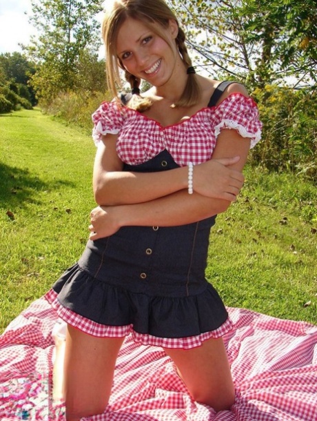 Smiley amateur teen Karen gets down and naughty at the picnic