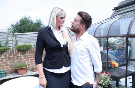 Tall UK woman gets banged doggystyle over an outdoor table by toy boy