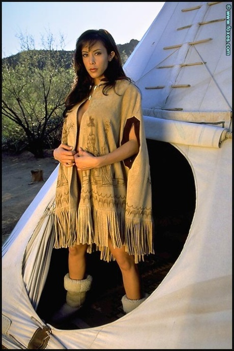 Solo girl Linda Oneil emerges from a tipi before baring her great body