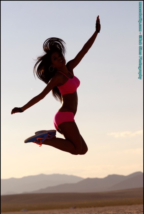 Asian bodybuilder Alma Villanueva models on a dry lake bed for a SFW shoot