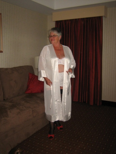 Old amateur Girdle Goddess uncovers her floppy tits and huge belly