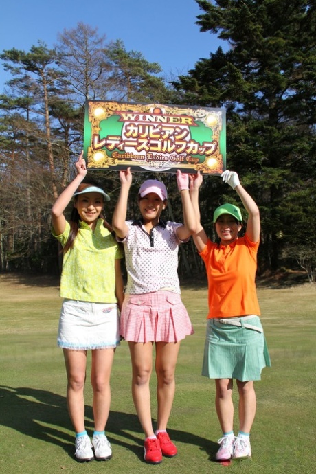Female Japanese golfers flash their tits before lifting up skirts on a course