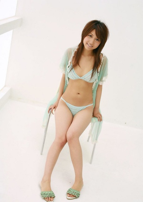 Japanese beauty Rika Yuuki models a lingerie ensemble during SFW action