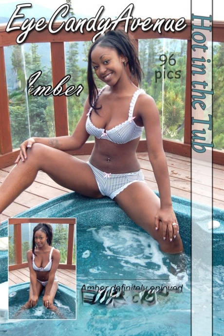 Amber, uma rapariga negra, mostra as suas grandes mamas enquanto entra numa banheira de hidromassagem ao ar livre