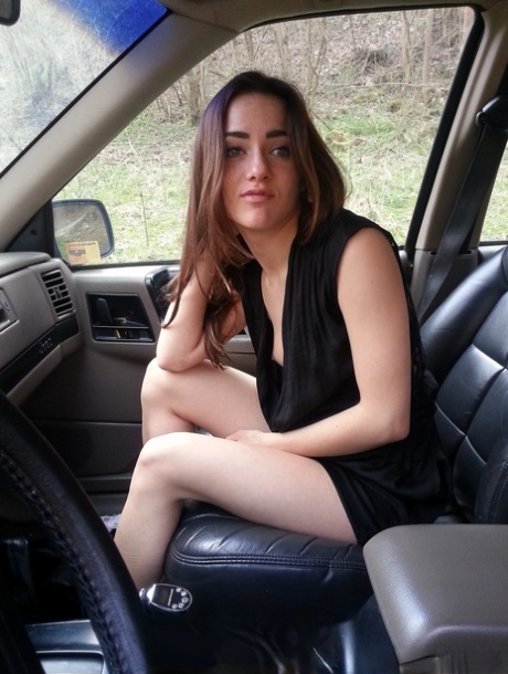 Horny girl Kasia Kelly takes selfies while playing with her pussy inside a car