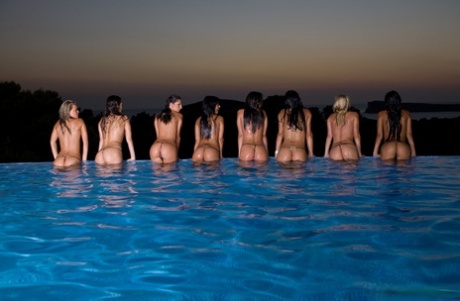 A group of hot chicks go for a skinny dip as the sun fades in the sky