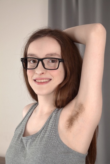 Nerdy girl Billie Rae proudly shows her hairy pits and pussy in glasses
