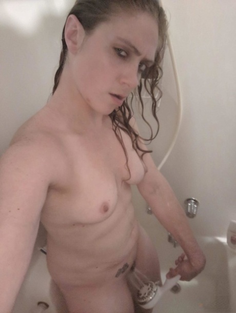 Amateur chick takes selfies during a masturbation session in a shower