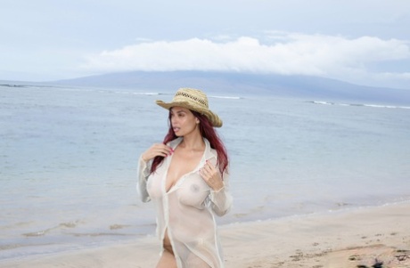 Hot Asian MILF Tera Patrick hits upon great solo poses while at the beach