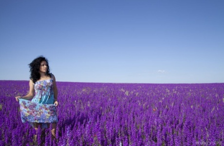 Brunette teen Maliko gets butt naked in a field of lavender