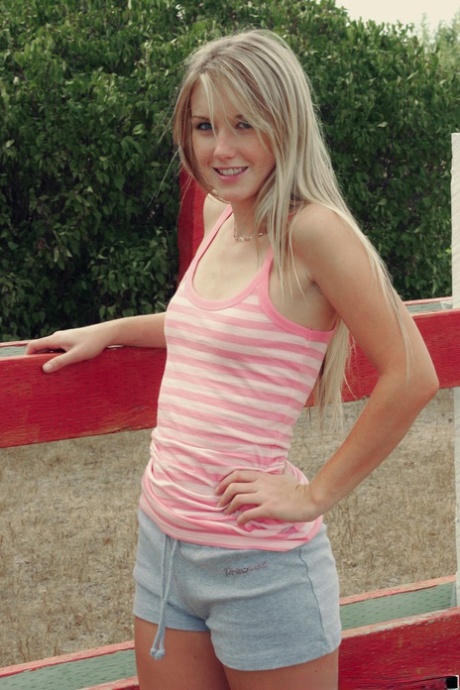 Sweet blonde amateur Jewel exposes herself on a backyard deck