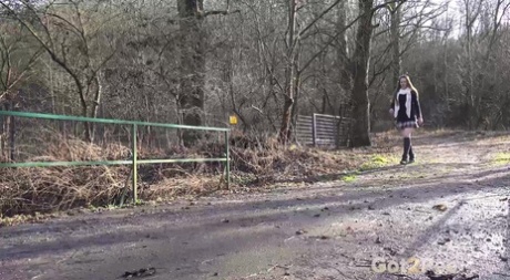 Caucasian student Valentina Ross takes a piss while crossing a public bridge