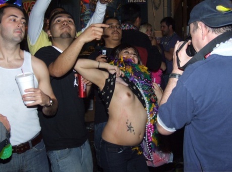 Amateur girls flash their breasts during a party at spring break
