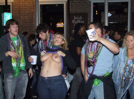 Amateur chicks flash their breasts after getting drunk at a party