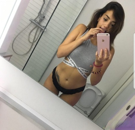 Amateur girl Peneloppe snaps a number of selfies in various states of undress