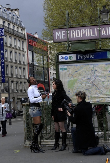 Brunette chick Penelope Tiger goes topless while being interviewed in Pigalle