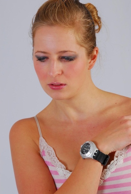 Amateur model Anna displays her Swatch Scuba watch while fully clothed