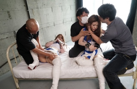 La pelirroja japonesa Reika Ichinose y Mio Ozora son tratadas con rudeza durante el sexo MMF