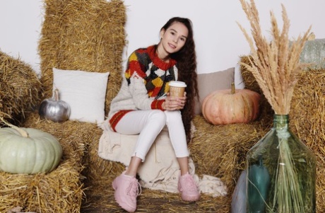 Skinny teen Leona Mia gets naked on bales of straw at harvest time