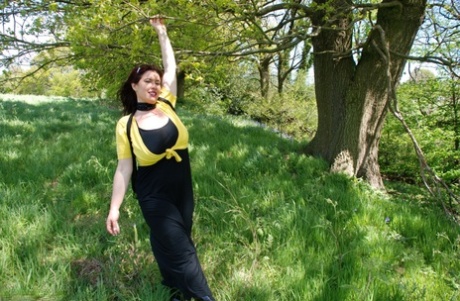 Older British lady Juicey Janey takes a piss in the countryside