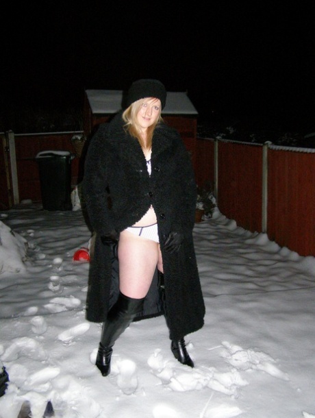 Plump chick Samantha goes nude on snow-covered ground in over the knee boots