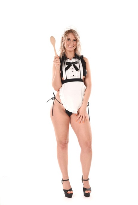 Hot blonde maid Sharon White plays with whipped cream while masturbating