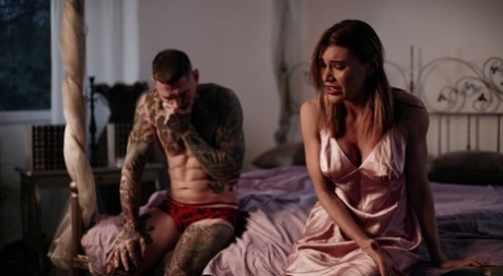 Kitana Lure receives a creampie during sex with a tattooed dude