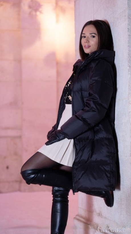 Young beauty Eve Sweet gets totally naked in a pleasing manner