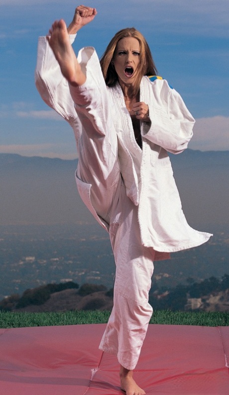 Candy Apples gets double fucked during a martial arts training session