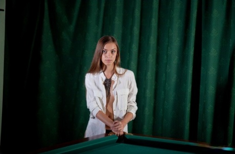 Barely legal beauty Sofy B gets bare naked atop a snooker table