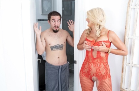 Blonde cougar Dana Rey seduces a young man in a crotchless bodystocking
