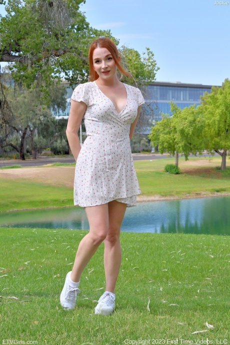 Natural redhead Jackie gets naked while visiting public places