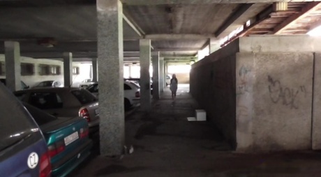 Caucasian girl Antonia Sainz takes a badly needed pee in a parking garage