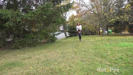 Pretty girl Maddi Black gets caught while taking a piss in a field