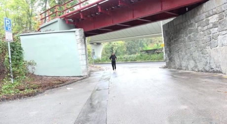 Sexy MILF Cynthia Vellons takes a badly needed pee near an overpass