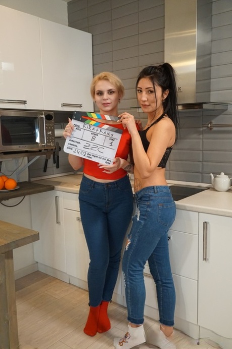 Kira Kaily and her lesbian lover have sex while in the kitchen