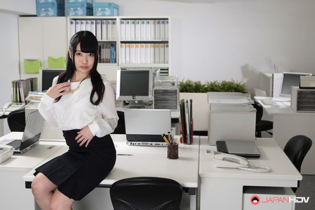 Japanese secretary Yui Ayase gets completely naked on top of her desk